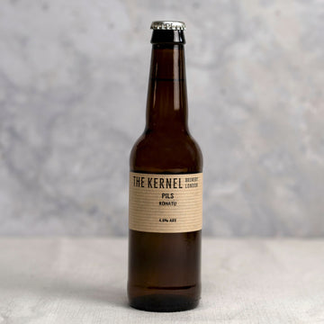 A 330ml brown glass bottle of Kernel Brewery pils beer.