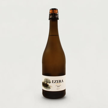 Bottle of Ezera cider on a white background.