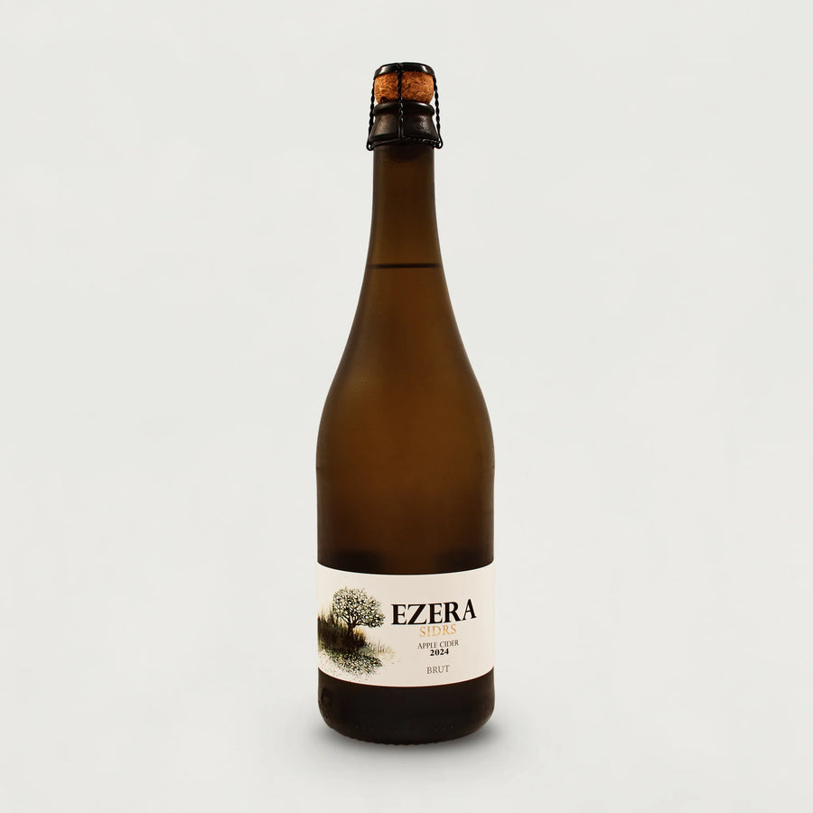 Bottle of Ezera cider on a white background.