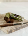 Lonzino di Fico fig salami on a wooden chopping board