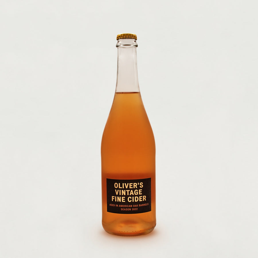 A large glass bottle of Oliver's Vintage Fine Cider.
