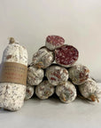 Pomona Salami with Westcombe Charcuterie label on a white background