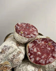 Slices of cured meat with a white background