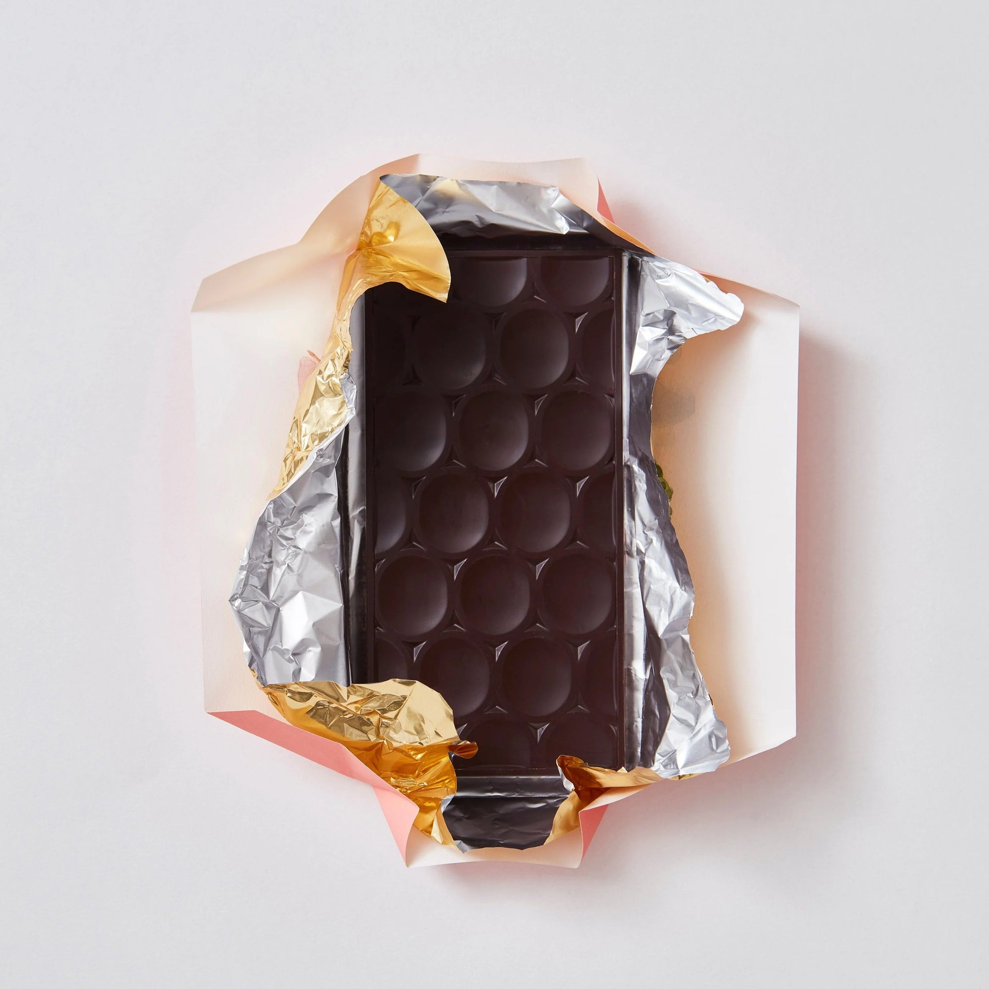 An open packet of Pump Street Chocolate Peru Dom Ramon dark chocolate.