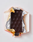 An open packet of Pump Street Chocolate Peru Dom Ramon dark chocolate.