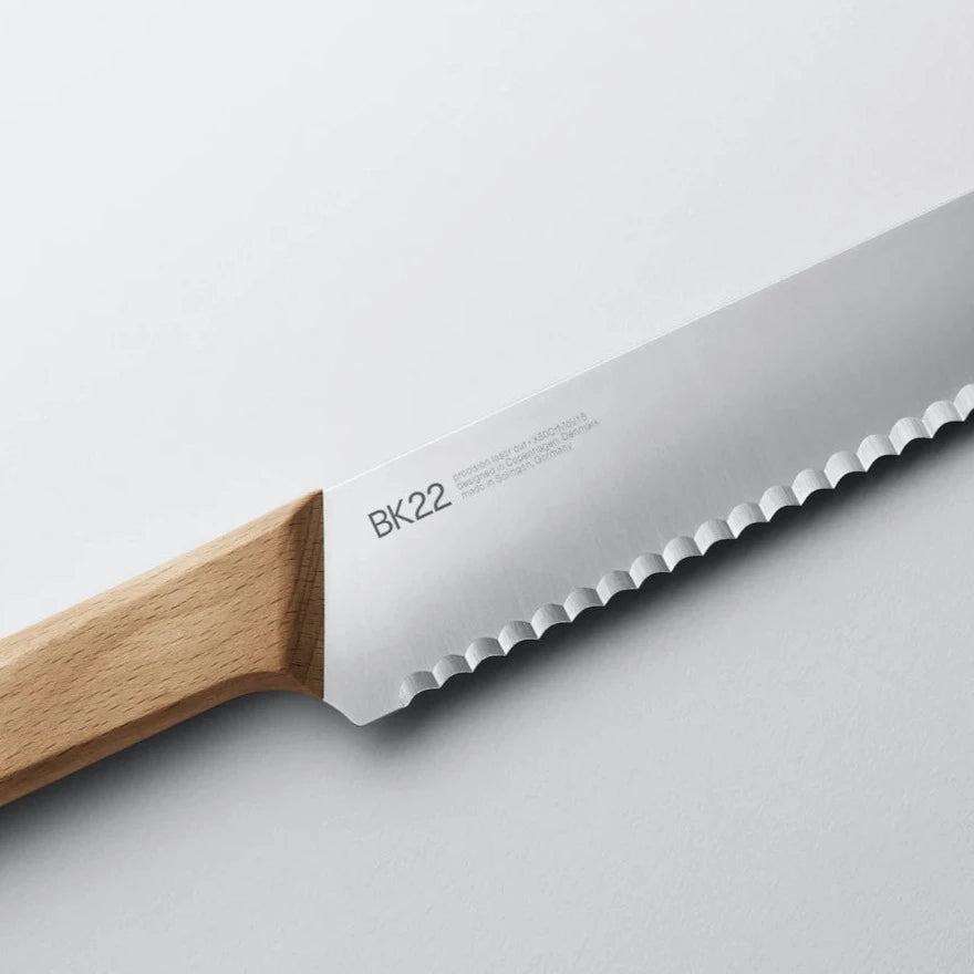 A close up image of a Veark wooden handled bread knife.