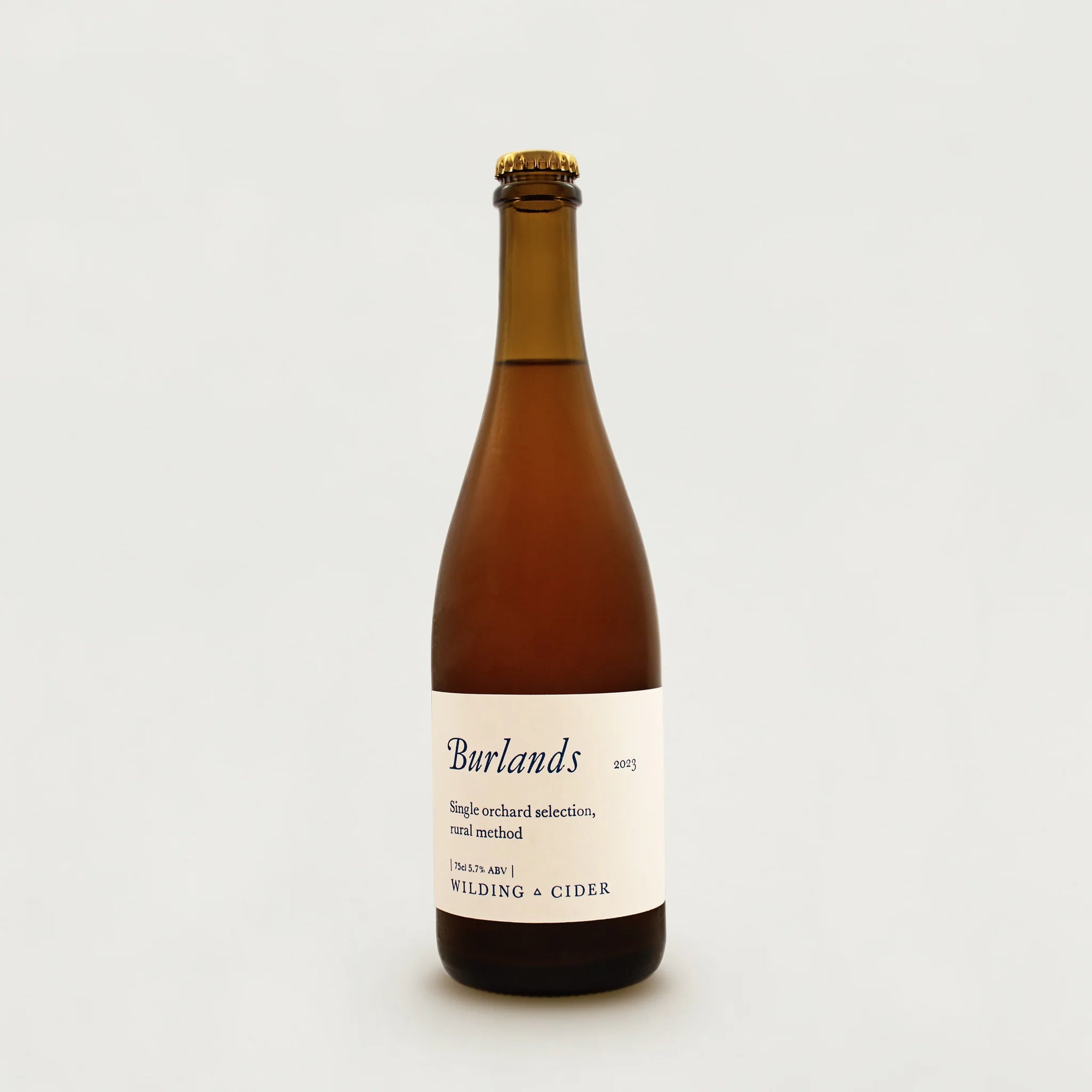 Bottle of Wilding Burlands cider on a white background