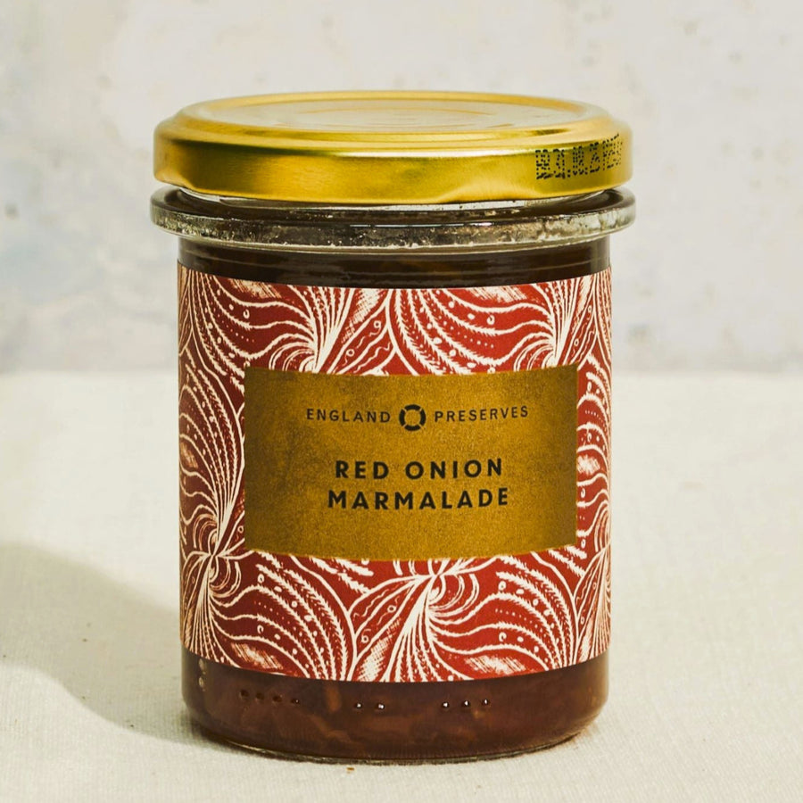 A jar of england preserves red onion marmalade.