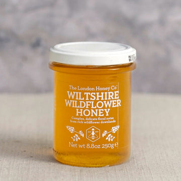 A jar of London Honey Company Wiltshire Wildflower Honey.