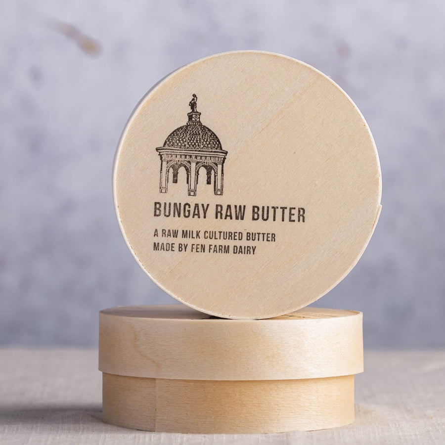 Two wooden boxes of Bungay raw butter