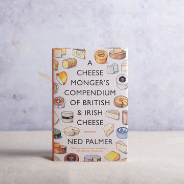 A hardback copy of the 'A Cheesemonger's Compendium of British and Irish Cheese' book by Ned Palmer.