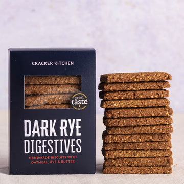 A packet of Cracker Kitchen dark rye digestive savoury biscuits.