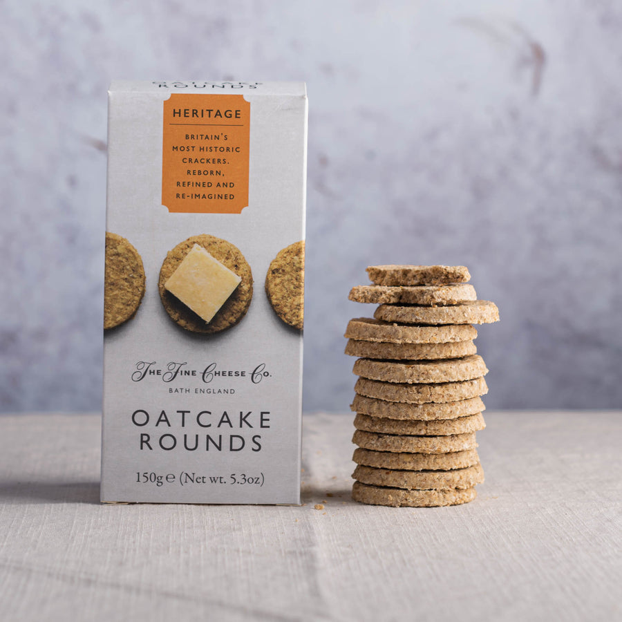 A box and stack of fine cheese company oatcakes.