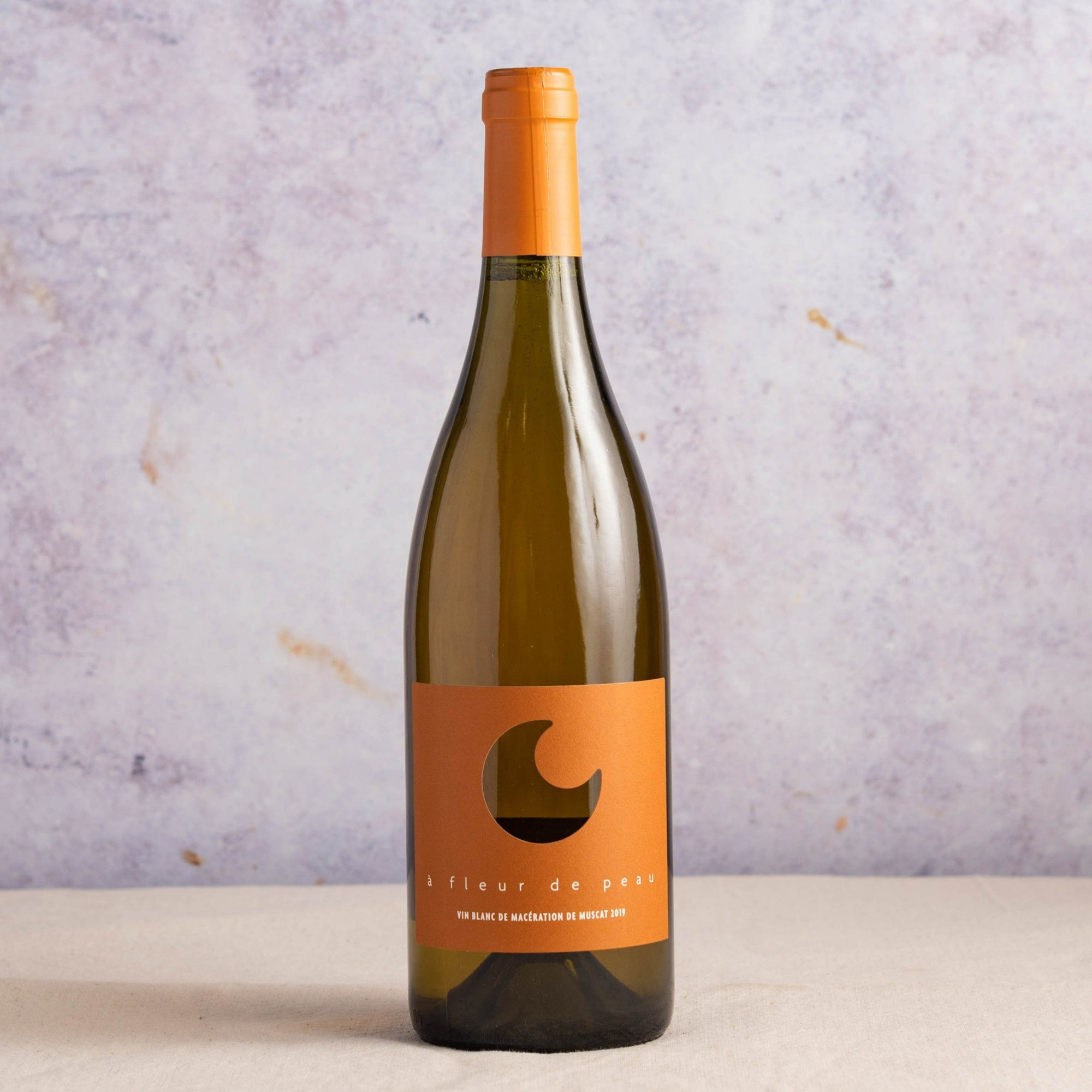 A 75cl bottle of 'Fleur de Peau' skin contact orange wine.