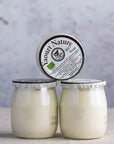 Glass jars of French organic natural yoghurt.