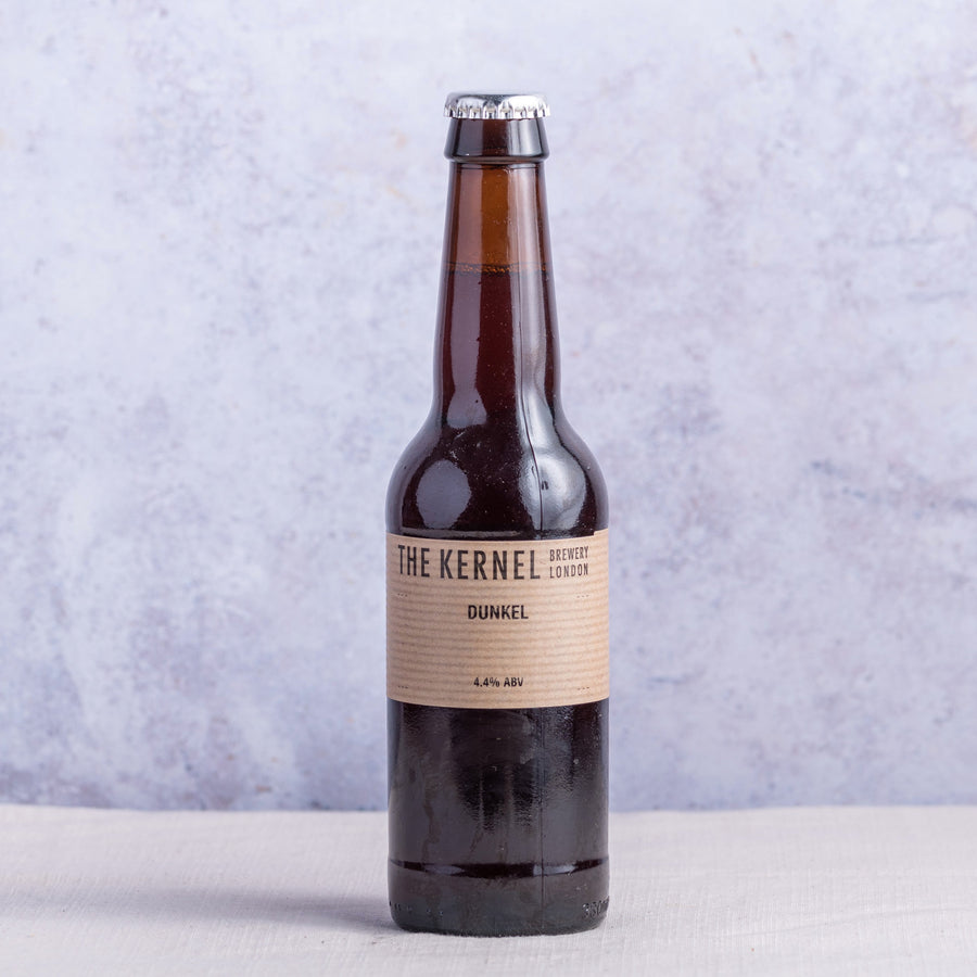 A 330ml brown glass bottle of Kernel Brewery 'Dunkel' beer.