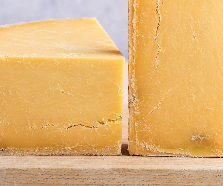 A close up of pieces of Montgomery's Cheddar.