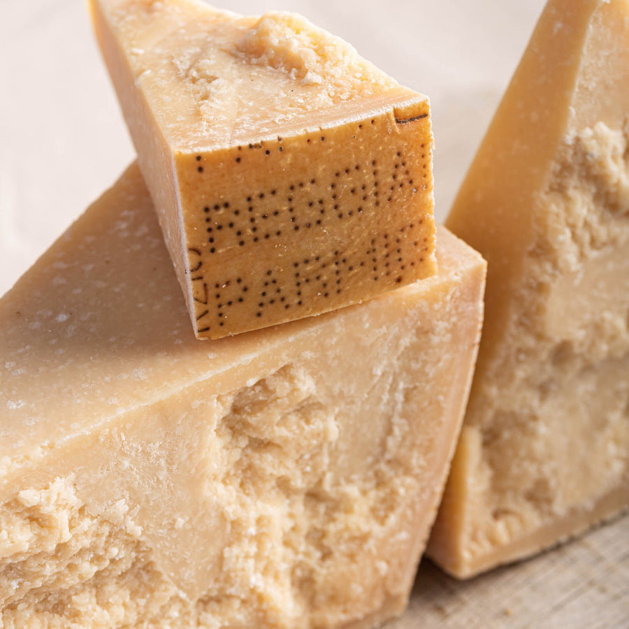 Pieces of cut Parmigiano cheese.