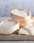 Perail ewe's milk cheese on a wooden board.