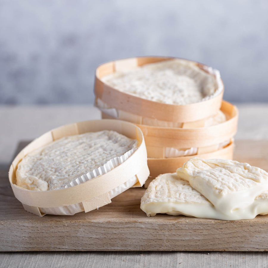 Perail ewe's milk cheese on a wooden board.
