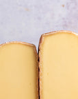 Pieces of Raclette hard cow's milk cheese.